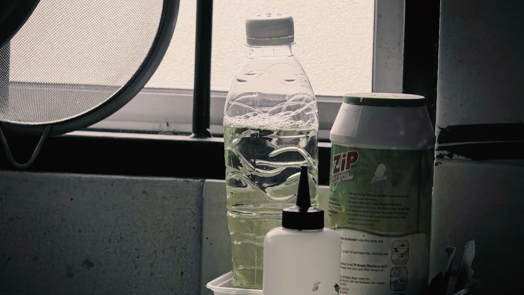 services-02 bottles-and-container-on-a-windowsill-rz7nnd5bbna