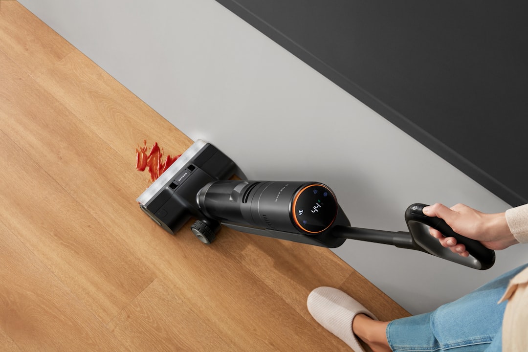 contact-img A Dreame wet dry vacuum cleans a tomato sauce spill along the wall for quick, reliable cleanup in busy households.